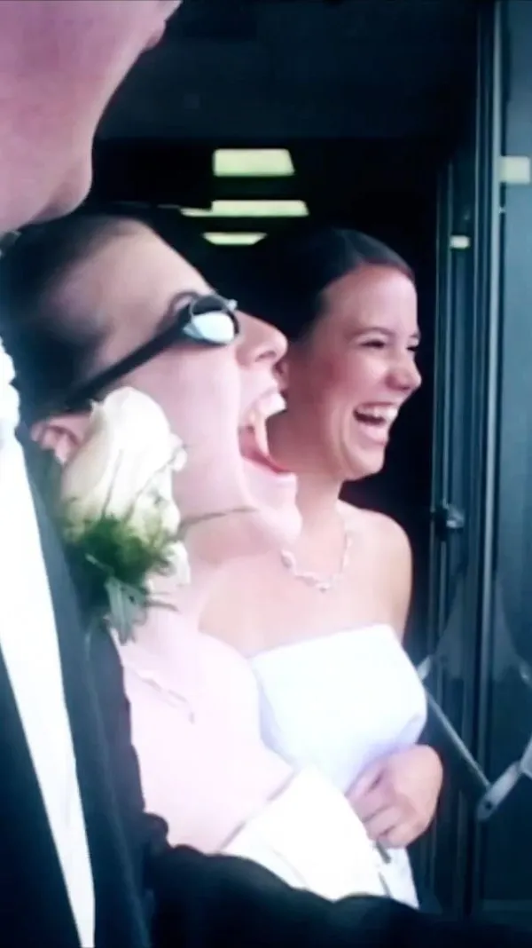 Bride reacting to the surprise DeLorean waiting outside the church