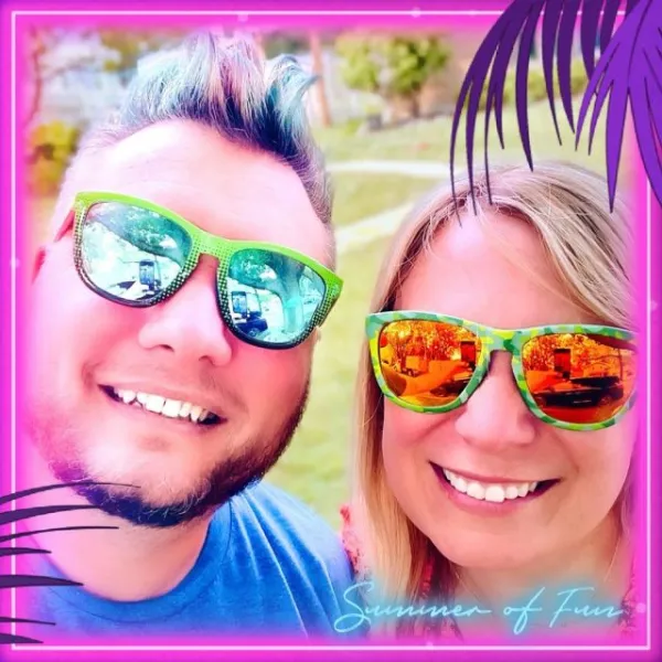 Greg and Chrissy in mirrored sunglasses on a summer day
