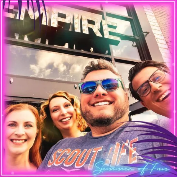 Group selfie under the Empire marquee
